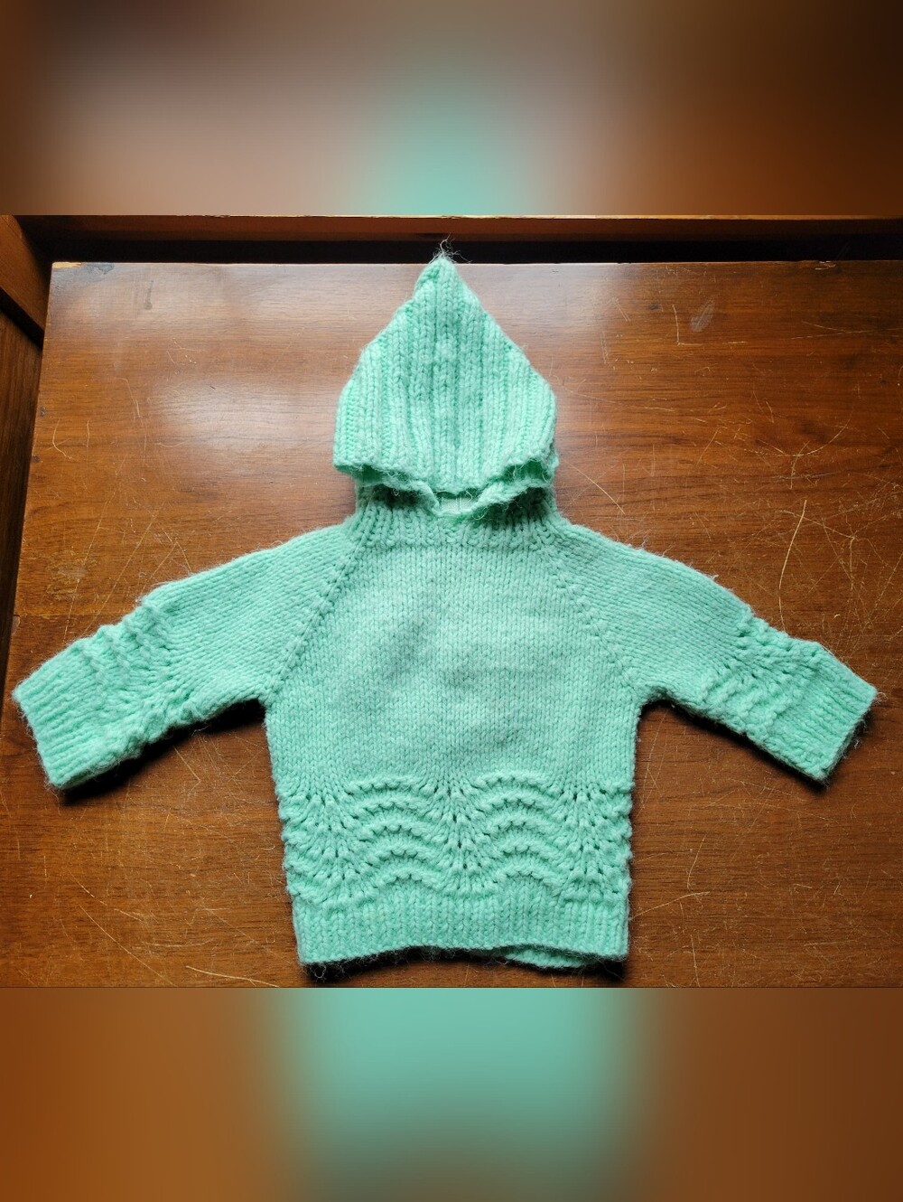 handmade light green knitted baby sweater with a hood-zipper In Back
